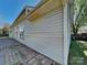 Exterior shot of house with siding, windows, and a brick paver patio at 2122 Shumard Cir, Indian Trail, NC 28079