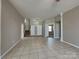 Spacious living room features tile flooring and lots of natural light at 2122 Shumard Cir, Indian Trail, NC 28079
