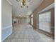 Expansive living room with tile flooring, great natural light, and open layout at 2122 Shumard Cir, Indian Trail, NC 28079