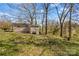 Backyard with mature trees at 216 E Georgia Ave, Bessemer City, NC 28016
