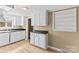Traditional kitchen featuring classic white cabinets and new, modern flooring at 216 E Georgia Ave, Bessemer City, NC 28016