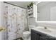 Charming bathroom with Paris-themed shower curtain and a modern, lit mirror over a gray vanity at 2425 Barkers Ridge Dr, Bessemer City, NC 28016