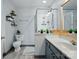 Bathroom features glass enclosed shower, gray vanity and toilet at 2425 Barkers Ridge Dr, Bessemer City, NC 28016