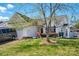 This charming home features a well-kept lawn and mature trees, creating a peaceful and inviting setting at 2425 Barkers Ridge Dr, Bessemer City, NC 28016