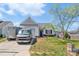 Charming home with a well-maintained front yard and inviting curb appeal under a bright, sunny sky at 2425 Barkers Ridge Dr, Bessemer City, NC 28016