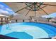 Above-ground pool with clear blue water, ladder, and an open view of the surrounding homes at 2425 Barkers Ridge Dr, Bessemer City, NC 28016