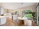 Modern kitchen with an island, stainless appliances, and a view to the back yard at 2529 Daniel St, Charlotte, NC 28205