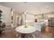 Bright, open kitchen featuring an island with seating and stainless steel appliances at 2529 Daniel St, Charlotte, NC 28205