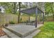 Outdoor patio featuring a pergola with seating, ideal for entertaining at 2529 Daniel St, Charlotte, NC 28205