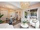 Cozy sunroom features stylish lighting, comfortable seating, and neutral color palette at 2529 Daniel St, Charlotte, NC 28205