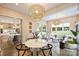 Stylish sunroom with views into the backyard and open to the kitchen at 2529 Daniel St, Charlotte, NC 28205