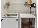 Well-equipped laundry room featuring modern washer and dryer units for convenient chores at 266 Iverson Way, Charlotte, NC 28203