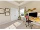 Another view of the bright home office, showcasing a window and a view of the backyard at 266 Iverson Way, Charlotte, NC 28203