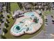 Aerial view of the community pool and recreational area with a lazy river and slide at 2768 Suffolk Pl, Fort Mill, SC 29715