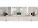 Modern bathroom with double sinks and a large mirror at 2768 Suffolk Pl, Fort Mill, SC 29715