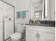 Bathroom featuring a glass shower, white subway tiles, and modern vanity with a gray countertop at 2768 Suffolk Pl, Fort Mill, SC 29715