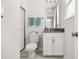 Bathroom featuring a glass shower, white subway tiles, and modern vanity with a gray countertop at 2768 Suffolk Pl, Fort Mill, SC 29715