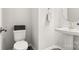 Stylish half bathroom features a modern vanity with elegant fixtures at 2768 Suffolk Pl, Fort Mill, SC 29715