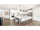 Kitchen featuring white cabinets, a large island with seating, and stainless steel appliances at 2768 Suffolk Pl, Fort Mill, SC 29715