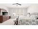 Bright, airy main bedroom with a large bed and neutral decor at 2768 Suffolk Pl, Fort Mill, SC 29715
