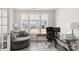 Bright and airy home office with large window, desk, and comfortable seating at 2768 Suffolk Pl, Fort Mill, SC 29715