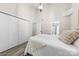 Bright bedroom with white walls, new floors, and a large closet, offering plenty of storage space at 306 S Cedar St # 10, Charlotte, NC 28202