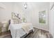 Bedroom with hardwood floors and modern decor, offering a comfortable and stylish living space at 306 S Cedar St # 10, Charlotte, NC 28202