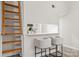 Open-concept kitchen with counter seating, perfect for entertaining and casual dining experiences at 306 S Cedar St # 10, Charlotte, NC 28202