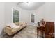 Cozy living room with plenty of natural light, perfect for relaxing or entertaining guests at 306 S Cedar St # 10, Charlotte, NC 28202