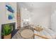 Modern living room with vaulted ceilings, fireplace, wet bar, and stylish decor at 306 S Cedar St # 10, Charlotte, NC 28202