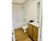Clean bathroom featuring a sink vanity, tub, and shower at 3144 Rickwood Dr, Newton, NC 28658