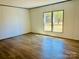 Bedroom features hardwood floors and natural light at 3144 Rickwood Dr, Newton, NC 28658