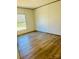 Bedroom with hardwood floors and bright light at 3144 Rickwood Dr, Newton, NC 28658
