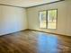 Inviting bedroom with natural light and new floors at 3144 Rickwood Dr, Newton, NC 28658