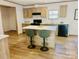 Well-appointed kitchen with natural wood cabinets, an island, and modern appliances at 3144 Rickwood Dr, Newton, NC 28658