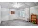 Basement features a window for natural light, and neutral carpet at 3717 Bodenham Ct, Charlotte, NC 28215