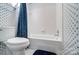 Clean, well-maintained bathroom featuring a bathtub with a shower at 3717 Bodenham Ct, Charlotte, NC 28215
