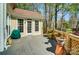 A spacious deck area features decorative railings and flower boxes, a door leading to the interior and natural light at 3717 Bodenham Ct, Charlotte, NC 28215
