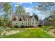 Charming home with lush front lawn, mature trees, and a well-manicured garden; perfect for suburban living at 3717 Bodenham Ct, Charlotte, NC 28215