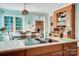 Well-lit kitchen with a smooth cooktop, spacious countertop, and open view of a sunny dining area at 3717 Bodenham Ct, Charlotte, NC 28215
