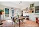 Cozy sunroom filled with natural light, featuring ceramic tile floors and views of the backyard at 3717 Bodenham Ct, Charlotte, NC 28215