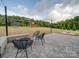Spacious backyard featuring a stone patio, fire pit, and playground at 3810 New Salem Rd, Monroe, NC 28110