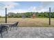 Large backyard with a stone patio, a trampoline, and a playset at 3810 New Salem Rd, Monroe, NC 28110
