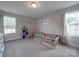 Well-lit bedroom with large windows and a play area at 3810 New Salem Rd, Monroe, NC 28110
