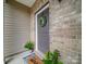 Inviting front entrance featuring a charming wreath and decorative plants at 3810 New Salem Rd, Monroe, NC 28110