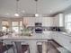 Modern kitchen with white cabinets, granite countertops, and stainless steel appliances at 3810 New Salem Rd, Monroe, NC 28110