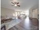 Open concept home with kitchen island that overlooks the living room provides for easy entertaining at 3810 New Salem Rd, Monroe, NC 28110
