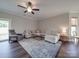 Large living room with comfortable seating and an area rug features lots of natural light at 3810 New Salem Rd, Monroe, NC 28110