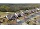 Overhead view of a neighborhood showcasing well-maintained homes and landscaping near a golf course, community living at its finest at 39617 Rosebay Ct, Fort Mill, SC 29707