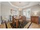 Stylish dining room with hardwood floors, modern chandelier, and neutral decor for a warm atmosphere at 39617 Rosebay Ct, Fort Mill, SC 29707
